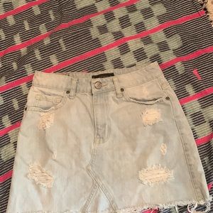 Distressed jean mini skirt